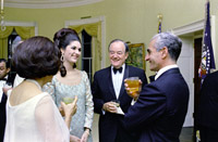 In conversation before State Dinner (foreground, L-R) Lady Bird Johnson (back to camera), Lynda Johnson, V.P. Hubert 
Humphrey, Shah Mohammad Reza Pahlavi of Iran, 08/22/1967