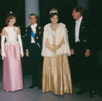 President and Mrs. Kennedy greet the Shah and the Shahbanou of Iran.